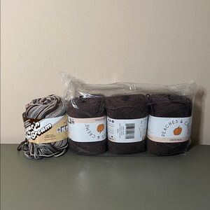 3 Peaches & Creme Yarn 
1 Sugar & Cream 
Lot of 4 together